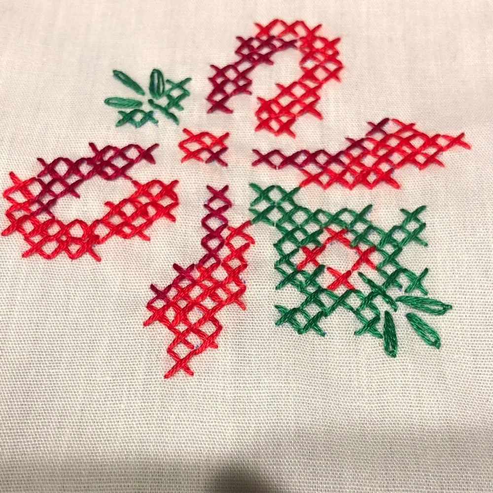 Embroidered Table Linens with Red Trim